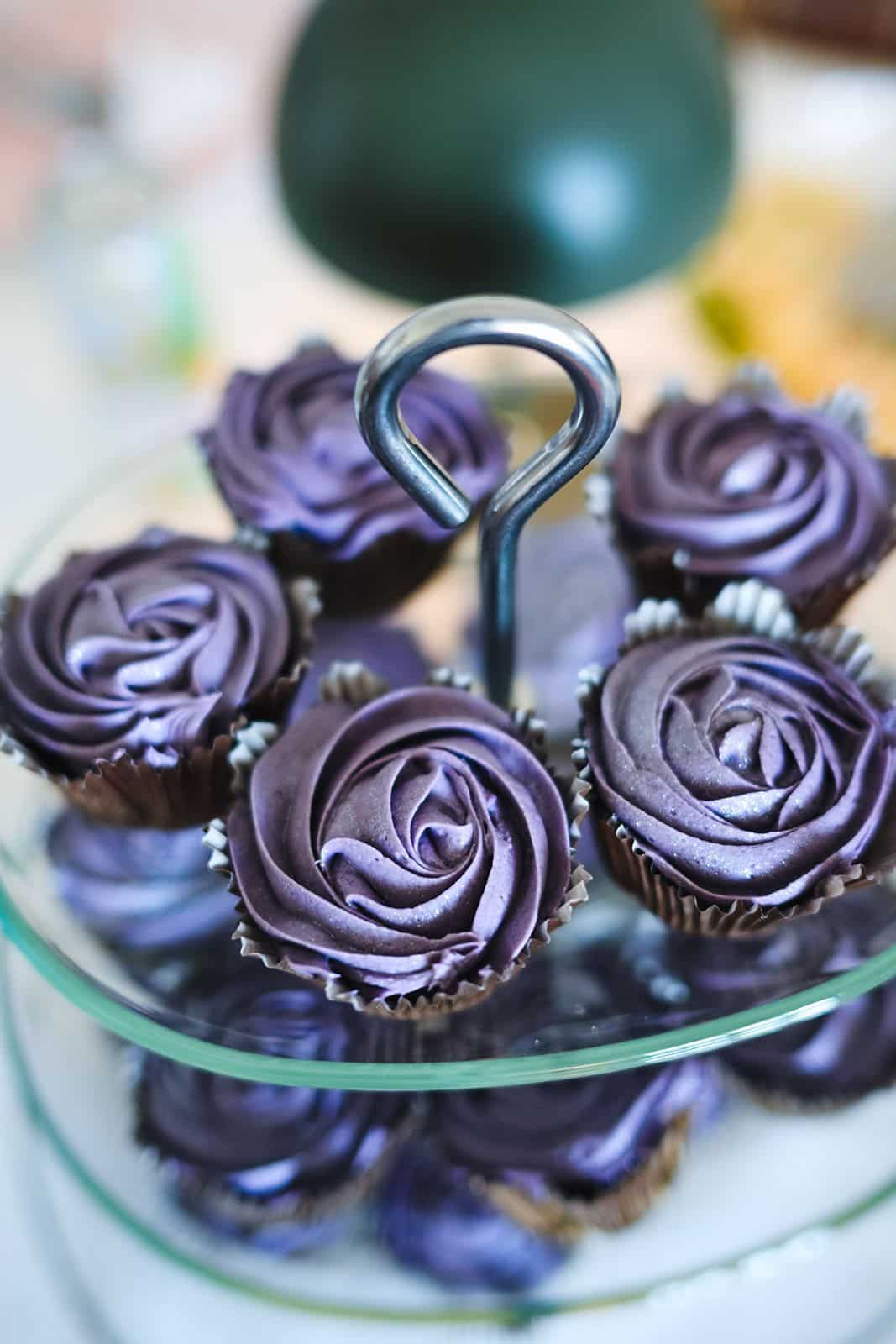 Purple cupcakes on a glass stand