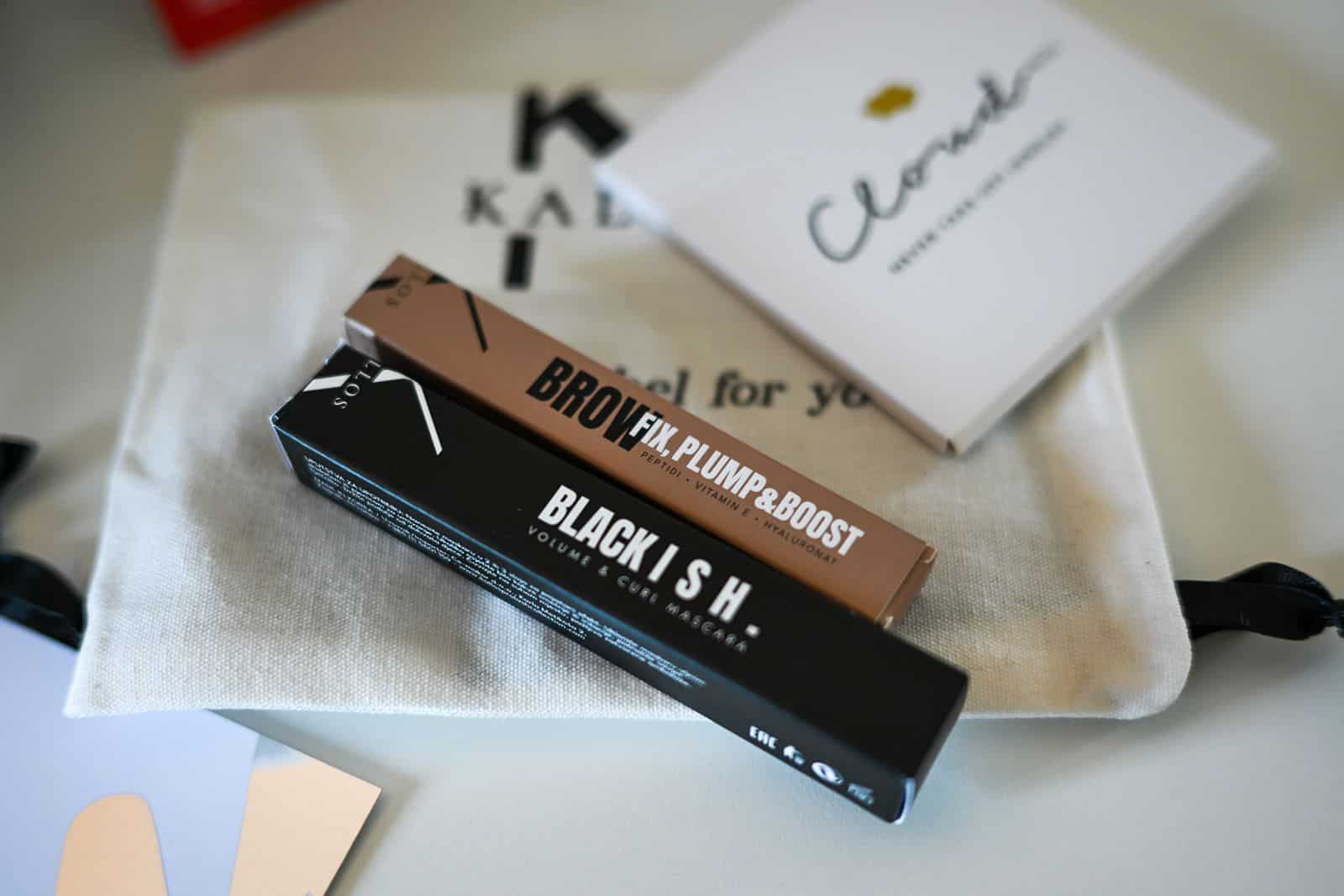 Cosmetic gifts from the partners arranged on a canvas bag