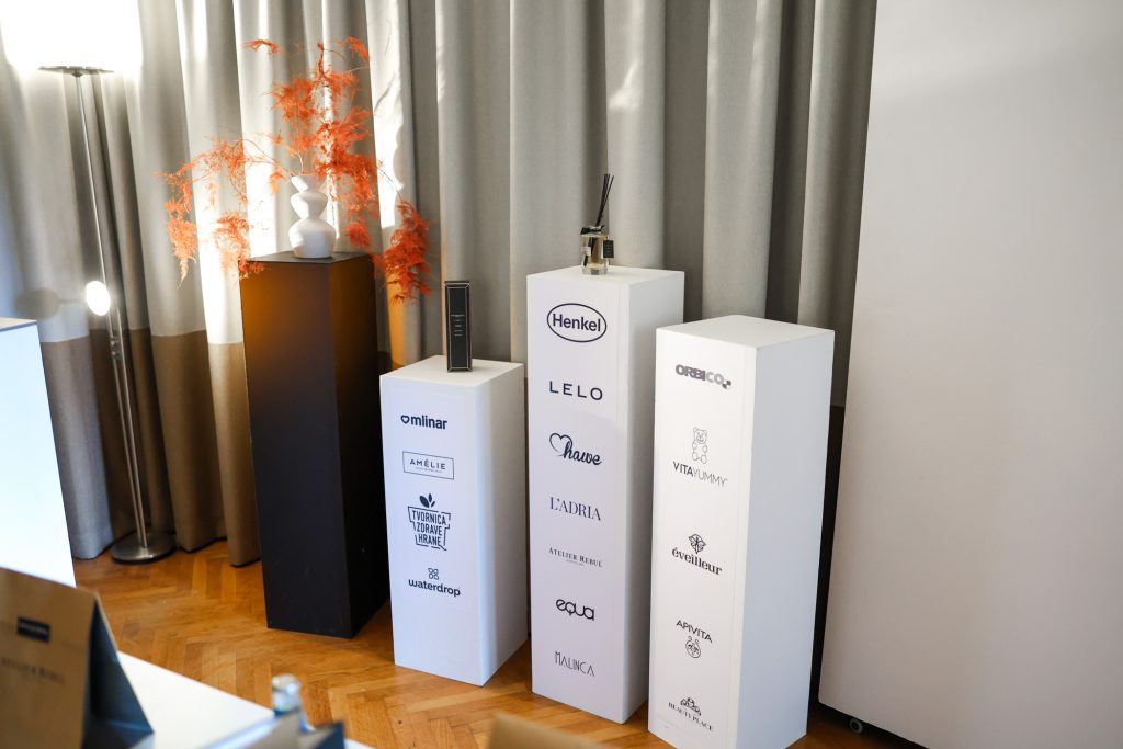 Plinths with the logos of Claude Code Saturday's partners